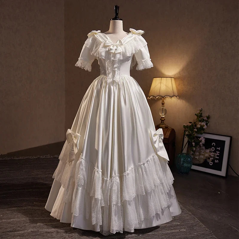 Vintage Victorian-inspired Lace Trimmed White Gown
