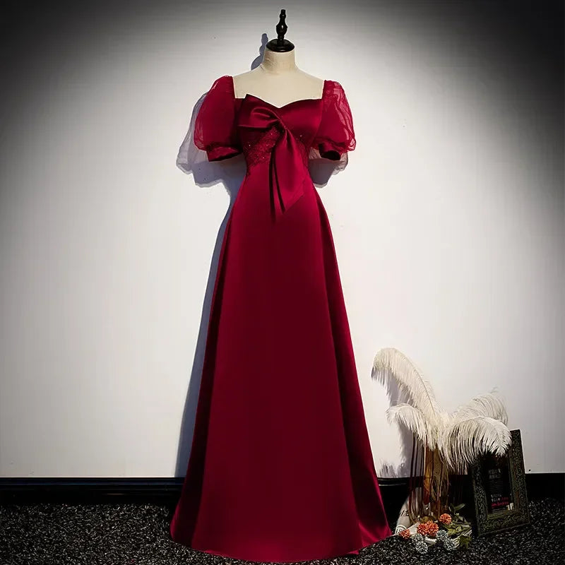Luxurious Puff Sleeve Burgundy Gown With Bow on Luulla