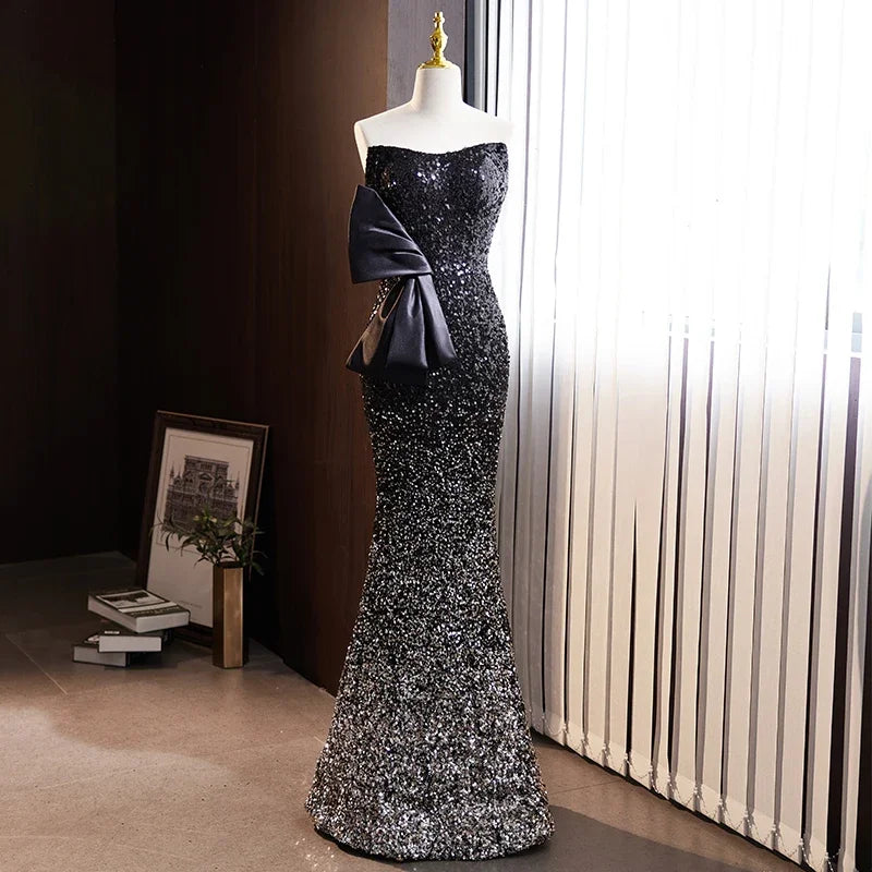Sparkling Black Sequin Gown With Bow Accent on Luulla